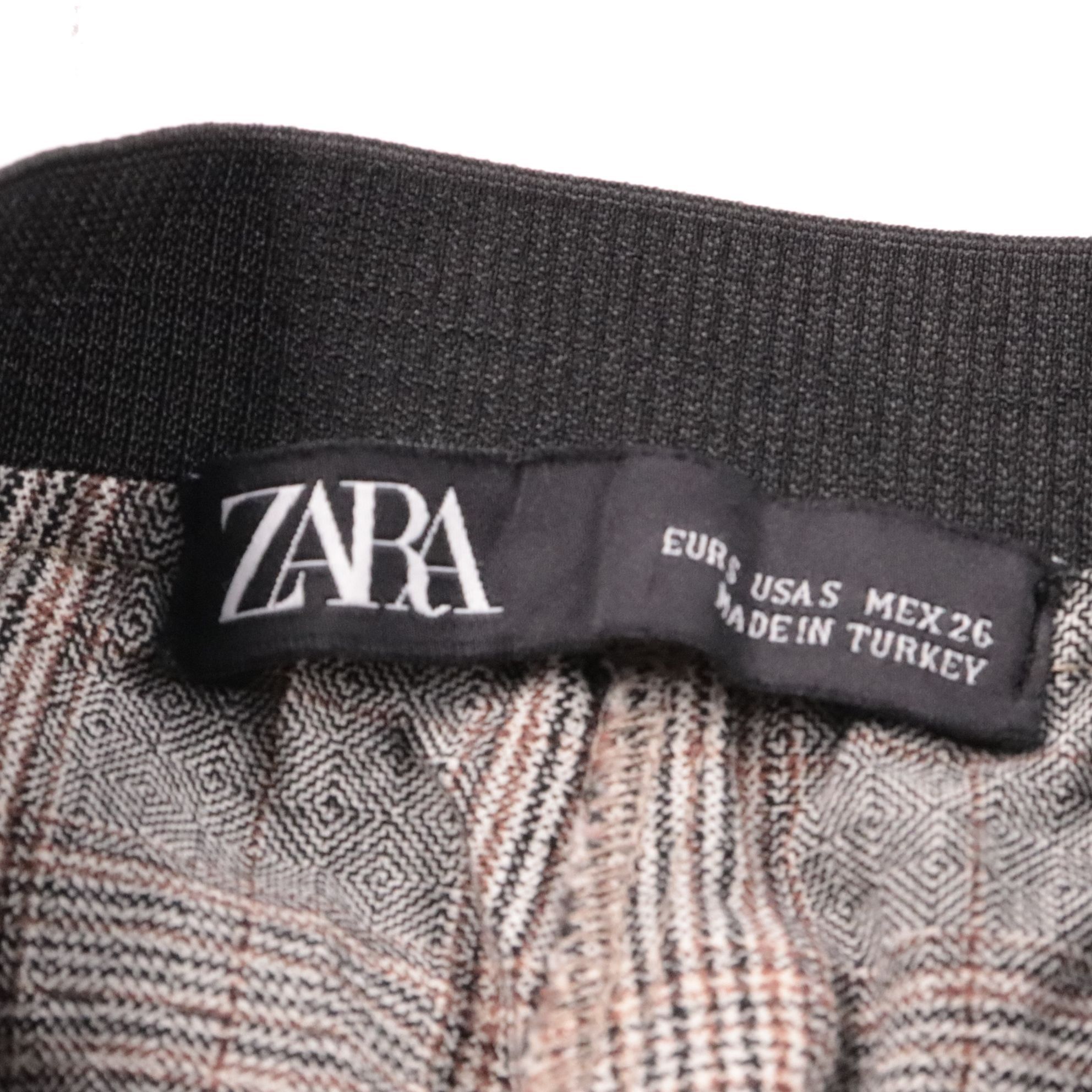 брюки Zara
